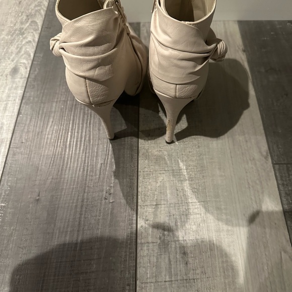 Cream 3 inch heel booties. Size 6. A few scuffs. Zippers work perfectly. - Picture 4 of 5